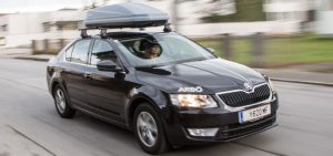 Sack und Pack für den Winter-Urlaub richtig verstauen 1 Ein Auto mit Dachbox, Stichwort Winter-Urlaub. (c) Chris Hofer