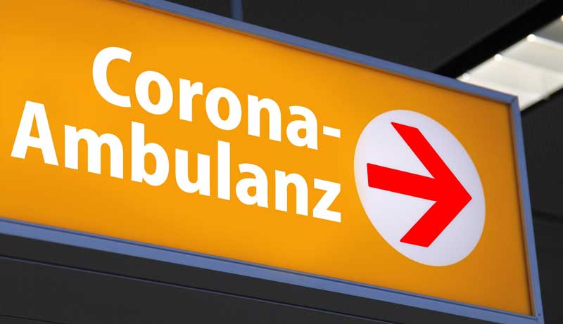Ein Schild mit der Aufschrift "Corona-Ambulanz" und einem Pfeil für Menschen, die sich mit dem Virus infiziert haben.
(c) Pixabay.com