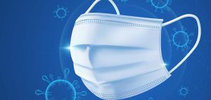 Das Covid-19 Maßnahmenpaket – konsequent leben schützt uns alle Eine Mund-Nasen-Schutzmaske, dahinter Corona-Viren. (c) Pixabay.com
