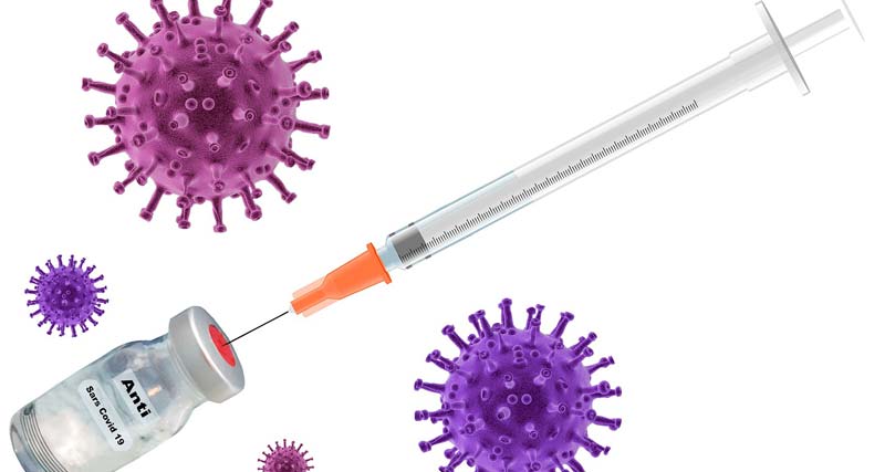 Eine Spritze, die aus einer Ampulle Impfstoff aufsaugt, daneben Corona-Viren, Stichwort Covid-19-Impfstoff.
(c) Pixabay.com