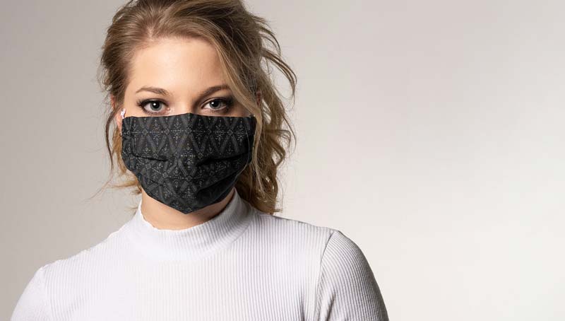 Eine Frau mit Mund-Nasen-Schutzmaske.
(c) Pixabay.com