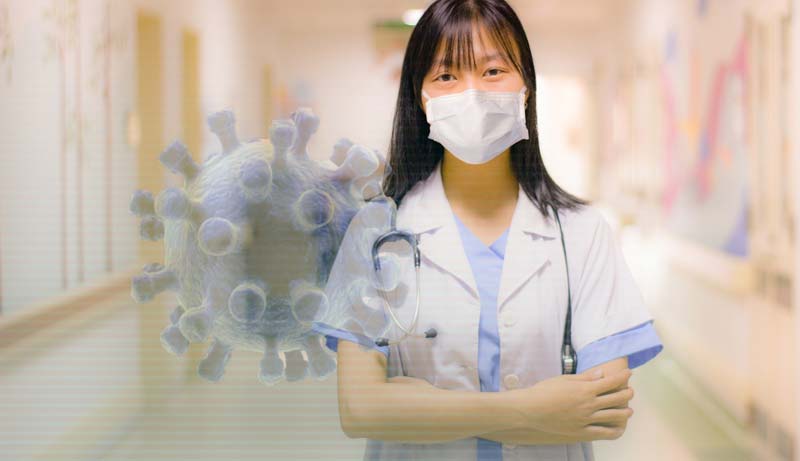 Eine Krankenschwester mit Mund-Nasen-Schutz, daneben ein Corona-Virus.
(c) Pixabay.com